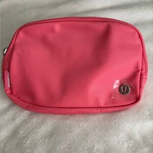 lululemon belt bag. NEW! Never used.  Beautiful pink color